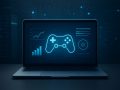 A laptop displaying a glowing game controller and data charts against a tech-themed background.